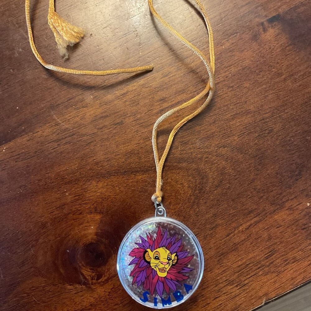 Vintage Disney lion King pendant necklace. Very colorful very bright from 1990s